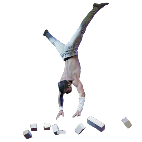 Last trick on handstand act dropping block and falling